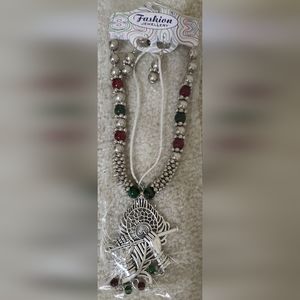 Brand new sterling silver necklace with earrings